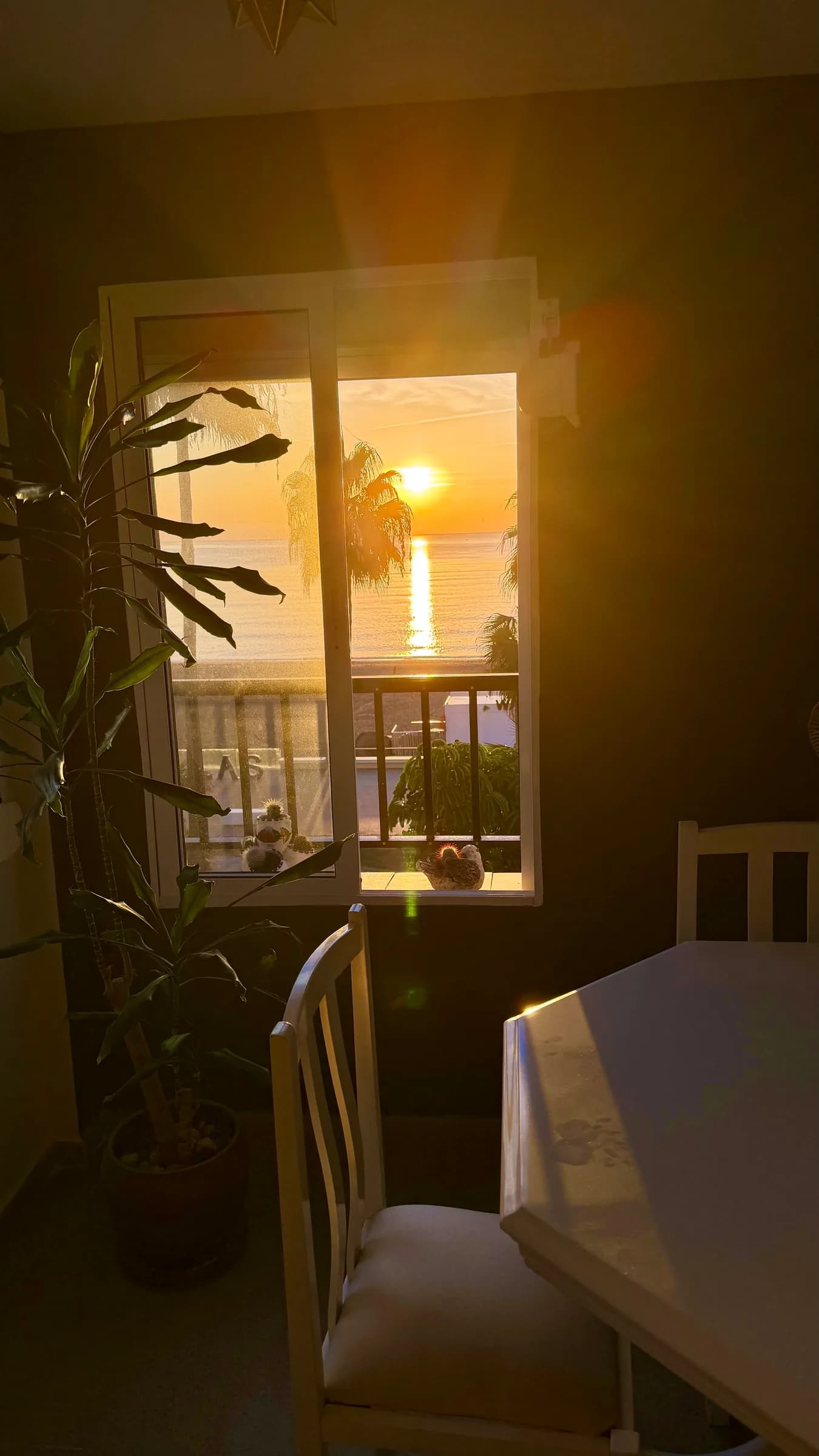 Sea-view balcony at sunset