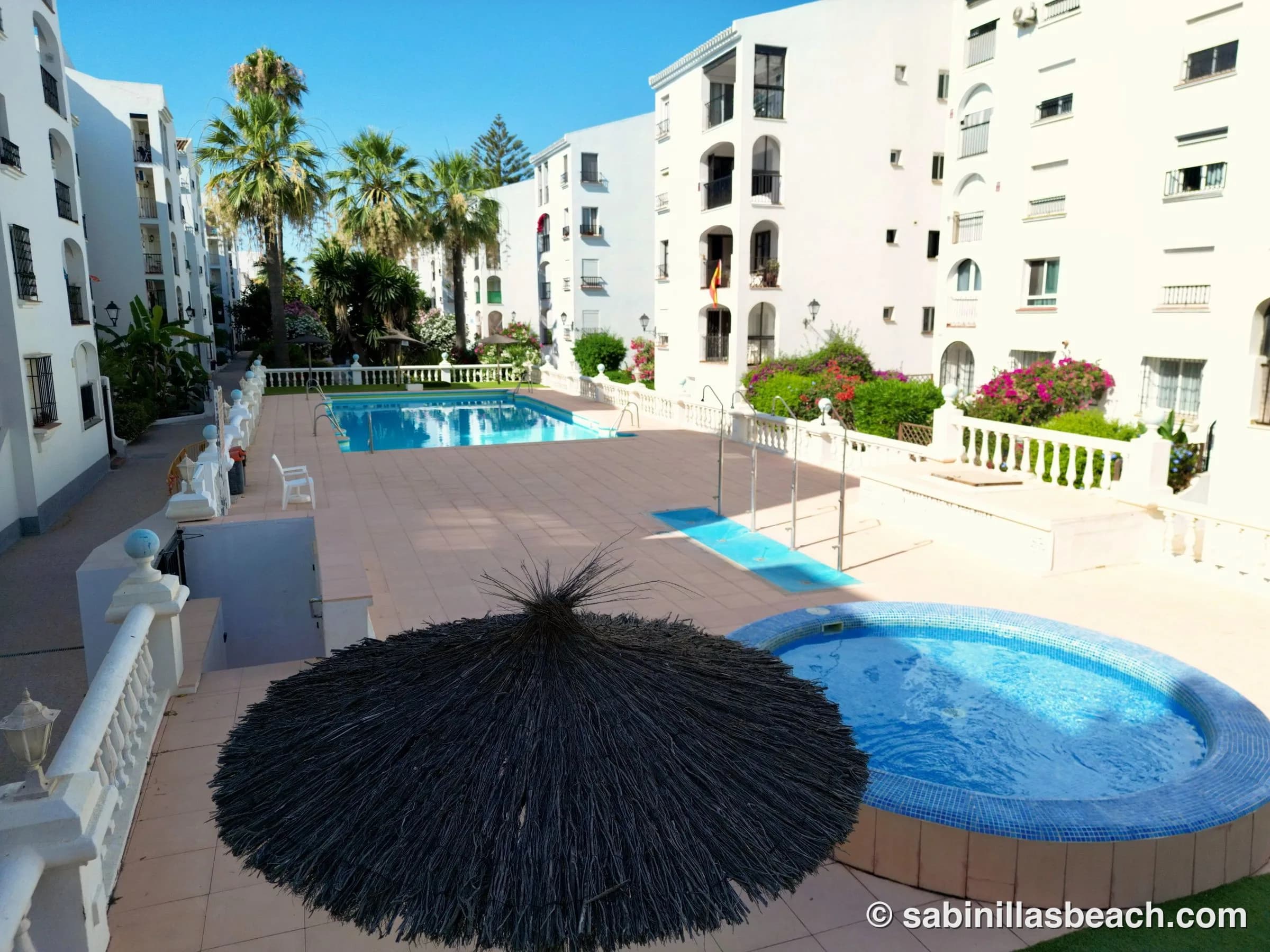 Community Pool with adult and kids pool and shaded area